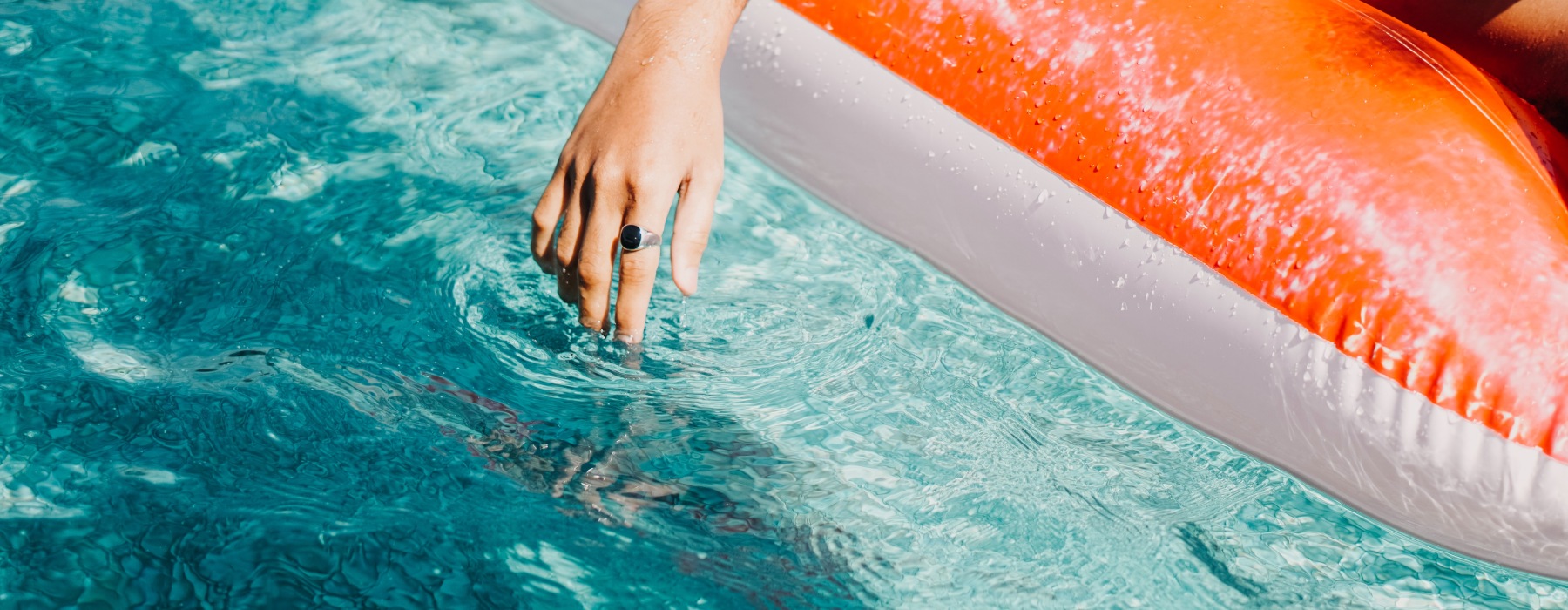 closeup of a person relaxing in the pool 